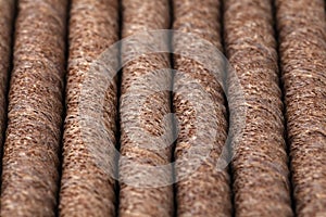 Tasty wafer roll sticks as background, top view. Crispy food. Close-up