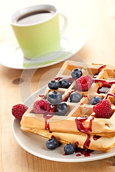 Tasty waffle with fruits