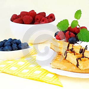 Tasty waffles with summery fruits
