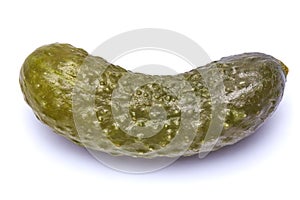 Tasty Whole green cornichon isolated on a white background