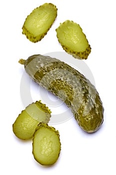 Tasty Whole green cornichon isolated on a white background