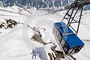 Tateyama Ropeway above snowy valley with shadow