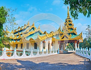 The complex roof of Tatmadaw Hall, Yangon, Myanmar photo