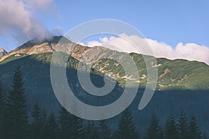 Tatra mountain peak view in Slovakia in sunny day - vintage retro film look