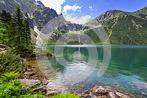 Tatra mountains and lake in Poland photo