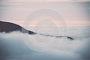 Tatra mountains in Slovakia covered with clouds - vintage effect