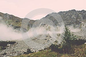 Tatra mountains in Slovakia covered with clouds - vintage effect