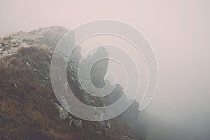 Tatra mountains in Slovakia covered with clouds - vintage effect