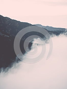 Tatra mountains in Slovakia covered with clouds - vintage effect