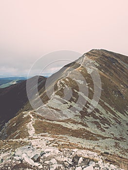 Tatra mountains in Slovakia covered with clouds - vintage effect