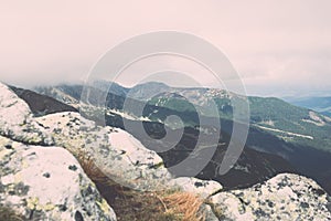 Tatra mountains in Slovakia covered with clouds - vintage effect