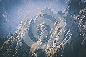 Tatra mountains in Slovakia covered with clouds - vintage film e