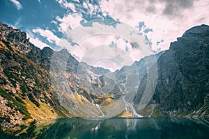 Tatra National Park, Poland. Calm Lake Czarny Staw Under Rysy And Summer Mountains Landscape. Beautiful Scenic View Of