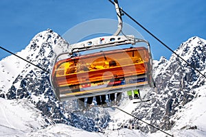 Ski lift and peak Lomnicky stit in High Tatras mountains in resort Tatranska Lomnica, Slovakia