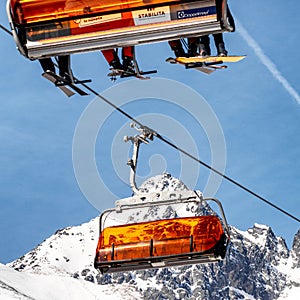 Ski lift and peak Lomnicky stit in High Tatras mountains in resort Tatranska Lomnica, Slovakia