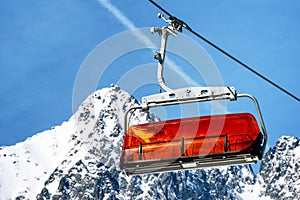 Ski lift and peak Lomnicky stit in High Tatras mountains in resort Tatranska Lomnica, Slovakia