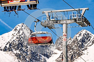 Ski lift and peak Lomnicky stit in High Tatras mountains in resort Tatranska Lomnica, Slovakia