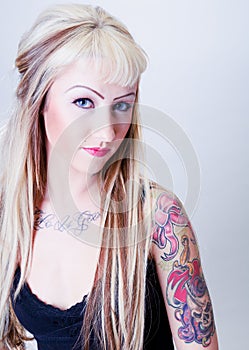 Tattoo Girl With Coy Look