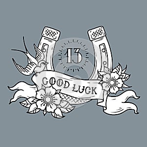 Tattoo gold horseshoe with roses, swallow, mystical number 13 and ribbon with lettering Good Luck.