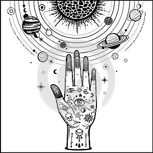 Tattoo human hand holds a stylized solar system, cosmic symbols, stars.