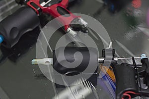 tattoo machine is on the table in a tattoo studio closeup