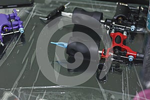tattoo machine is on the table in a tattoo studio closeup