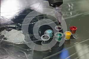 tattoo machine is on the table in a tattoo studio closeup