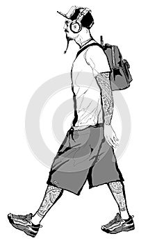 Tattooed hipster boy with cap and headphone walking listening music