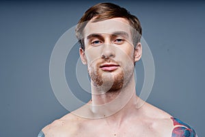 tattooed man naked torso bodybuilder Fitness portrait close-up