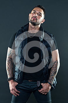 Tattoos great way express masculinity and manliness. Bearded man posing with tattoos. Masculinity and fashion concept photo