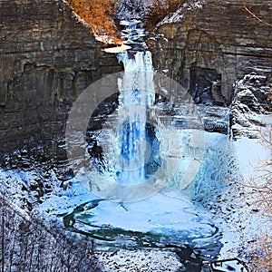 Taughannock Falls glacial gorge waterfall with colors of winter