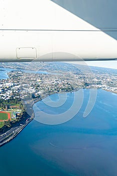 Tauranga harbour and urban peninsula aerial image with plane win