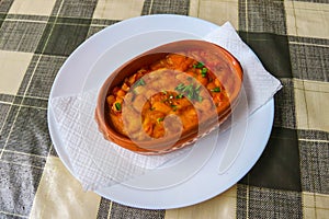 Tavche gravche (baked beans) - traditional Macedonian dish on table