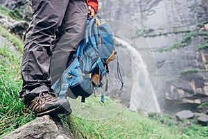 Taveler legs in wet outoor shoes hear the Jogini waterfall