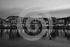 Taverns in the port of Rethymno city in the evening on the island of Crete