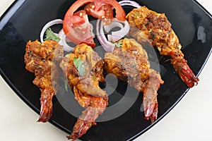 Tawa Prawn - Goan dish made of prawns from India photo