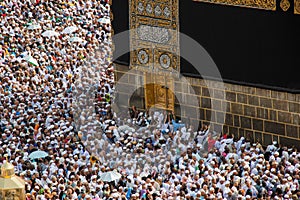 Tawaf. Holy Kaaba. Crowd of pilgrims circumambulate around Kaaba.
