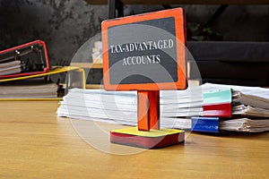 Tax advantaged accounts sign and documents.