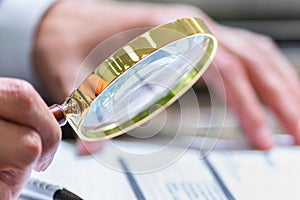 Tax Audit Using Magnifying Glass