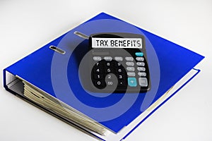 TAX benefits word on calculator. Business and tax concept. Time to pay tax in year