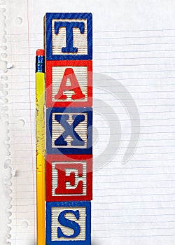 Tax Blocks with chewed pencil