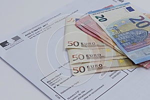 Tax concept with euros banknotes