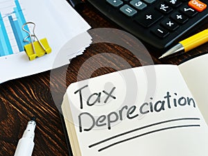 Tax depreciation phrase on the notepad page.