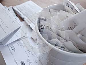 Tax documents and receipts spread on a table photo