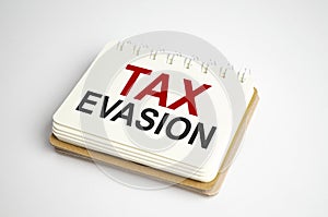 tax evasion Text on business paper on office table