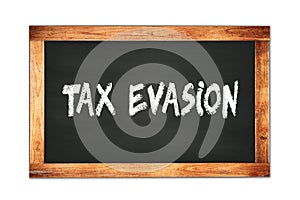 TAX  EVASION text written on wooden frame school blackboard