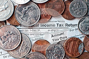 Tax forms with coins