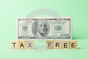 Tax free concept on a background of dollars. Tax-free purchase and sale