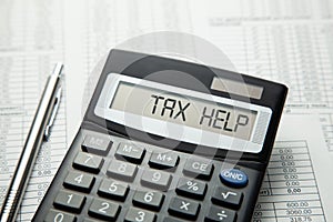 Tax help. On display of calculator is written tax help