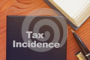 Tax Incidence is shown on the conceptual business photo photo